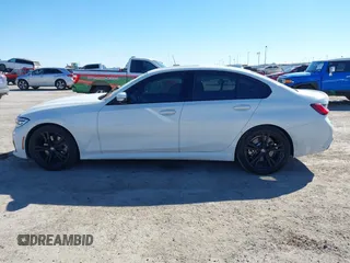 2022 BMW 3 Series 330i with VIN 3MW5R1J04N8C30165, listed as a IAAI auction lot 41412370 with 49,015 mi miles and . Bid and sale history available at DreamBid. Image 14.