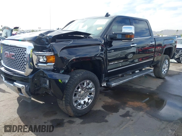 2015 GMC Sierra 2500HD Denali z VIN 1GT120E86FF667058, wystawiony jako IAAI lot #42212058 z przebiegiem 104 069 mil mil oraz . Historia ofert i sprzedaży dostępna na DreamBid. Obrazek 17.