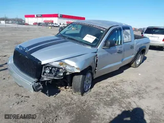 2006 Dodge Dakota SLT with VIN 1D7HE48N76S640351, listed as a IAAI auction lot 41121248 with 155,463 mi miles. Bid and sale history available at carsss.com. Image 2.
