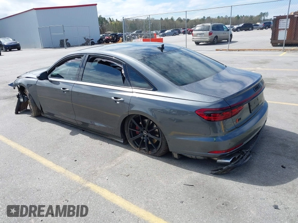 2022 Audi S8 with VIN WAULSAF83NN001905, listed as a IAAI auction lot 41813861 with 18,461 mi miles and . Bid and sale history available at DreamBid. Image 3.