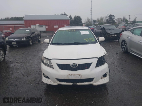 2010 Toyota Corolla with VIN 2T1BU4EEXAC413978, listed as a IAAI auction lot 41953898 with 121,676 mi miles. Bid and sale history available at carsss.com. Image 13.