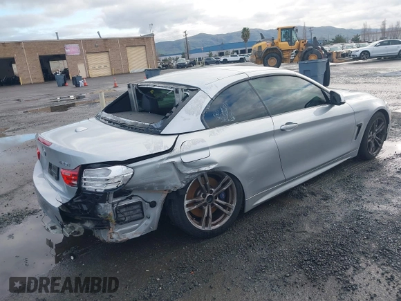 2015 BMW 4 Series 428i with VIN WBA3V7C50FP772915, listed as a IAAI auction lot 41526014 with 116,800 mi miles. Bid and sale history available at carsss.com. Image 4.