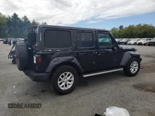 2023 Jeep Wrangler Sport S with VIN 1C4HJXDN6PW618252, listed as a Copart auction lot 55939455 with 69,681 mi miles and Salvage title. Bid and sale history available at DreamBid. Image 3.