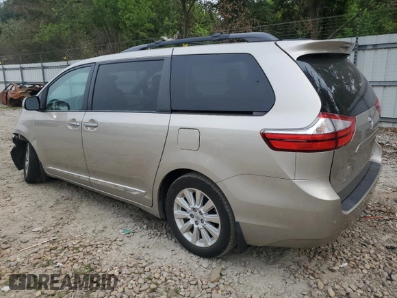 2015 Toyota Sienna Limited with VIN 5TDDK3DC9FS105465, listed as a Copart auction lot 59595595 with 80,348 mi miles and Salvage title. Bid and sale history available at DreamBid. Image 2.