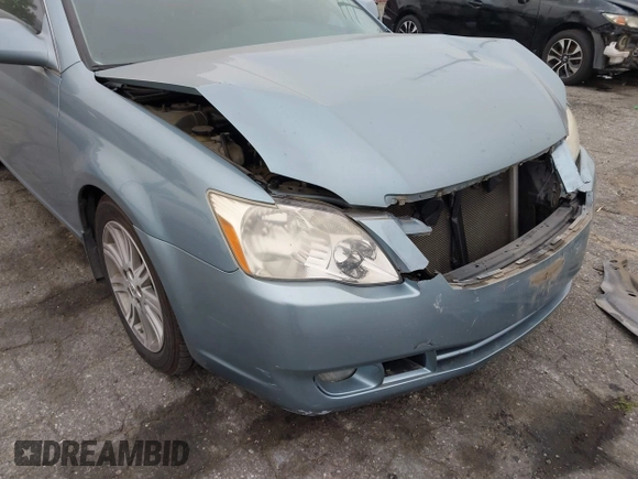 2007 Toyota Avalon XL with VIN 4T1BK36B07U233873, listed as a IAAI auction lot 42042179 with 58,612 mi miles. Bid and sale history available at carsss.com. Image 6.