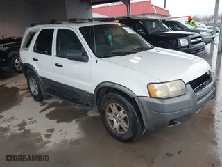 2004 Ford Escape XLT with VIN 1FMCU93174KB22029, listed as a IAAI auction lot 41537861 with 314,964 mi miles. Bid and sale history available at carsss.com. Image 1.