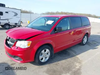 2013 Dodge Grand Caravan SE with VIN 2C4RDGBG9DR723999, listed as a IAAI auction lot 41993367 with 177,549 mi miles and . Bid and sale history available at DreamBid. Image 2.