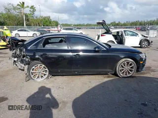 2019 Audi A4 Premium z VIN WAUGMAF45KN008083, wystawiony jako IAAI lot #41962385 z przebiegiem Nie podano mil oraz . Historia ofert i sprzedaży dostępna na DreamBid. Obrazek 13.