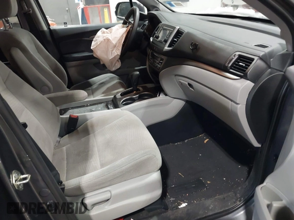 2016 Honda Pilot LX with VIN 5FNYF6H1XGB111488, listed as a IAAI auction lot 41581706 with 100,028 mi miles. Bid and sale history available at carsss.com. Image 5.