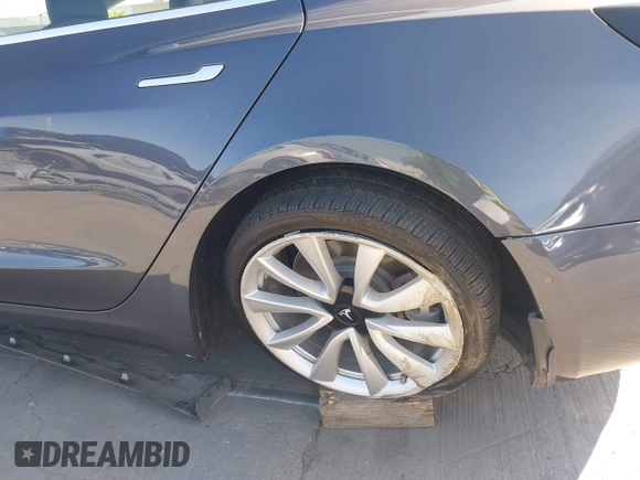 2018 Tesla Model 3 Long Range Battery with VIN 5YJ3E1EA4JF024102, listed as a IAAI auction lot 42100621 with 86,298 mi miles and . Bid and sale history available at DreamBid. Image 18.