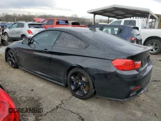 2015 BMW M4 with VIN WBS3R9C56FF708654, listed as a Copart auction lot 40082774 with 82,713 mi miles and Clean Title. Bid and sale history available at carsss.com. Image 2.