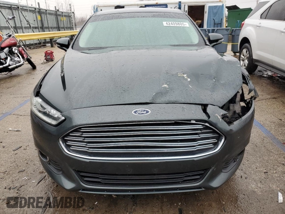 2015 Ford Fusion SE z VIN 3FA6P0H71FR302337, wystawiony jako Copart lot #42409805 z przebiegiem 156 783 mil mil oraz Szkoda całkowita • Salvage title. Historia ofert i sprzedaży dostępna na DreamBid. Obrazek 5.