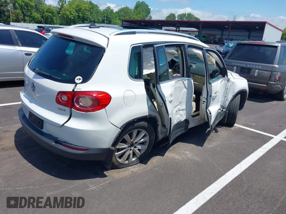 2010 Volkswagen Tiguan with VIN WVGAV9AX0AW510512, listed as a IAAI auction lot 42532527 with 193,910 mi miles and . Bid and sale history available at DreamBid. Image 4.