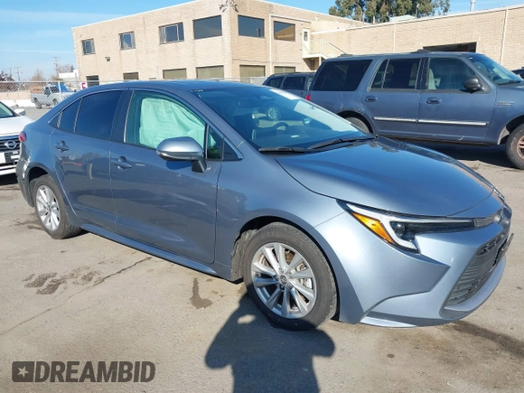 2023 Toyota Corolla Hybrid LE with VIN JTDBCMFEXP3006343, listed as a IAAI auction lot 41056503 with 121,690 mi miles. Bid and sale history available at carsss.com. Image 1.