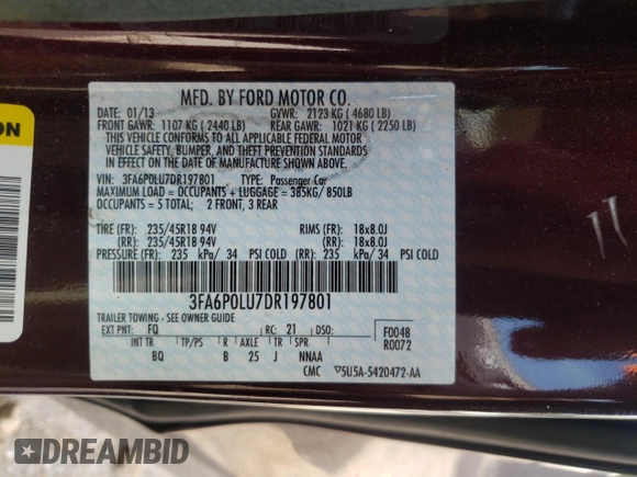 2013 Ford Fusion SE Hybrid z VIN 3FA6P0LU7DR197801, wystawiony jako Copart lot #60468095 z przebiegiem 169 215 mil mil oraz Szkoda całkowita • Salvage title. Historia ofert i sprzedaży dostępna na DreamBid. Obrazek 12.