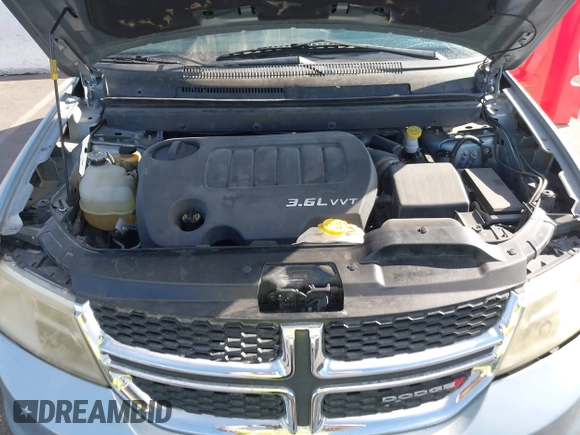 2013 Dodge Journey SXT with VIN 3C4PDCBG4DT584135, listed as a IAAI auction lot 41902149 with 165,700 mi miles and . Bid and sale history available at carsss.com. Image 10.