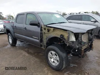 2013 Toyota Tacoma z VIN 3TMLU4ENXDM109775, wystawiony jako IAAI lot #41987452 z przebiegiem 181 347 mil mil oraz . Historia ofert i sprzedaży dostępna na DreamBid. Obrazek 1.