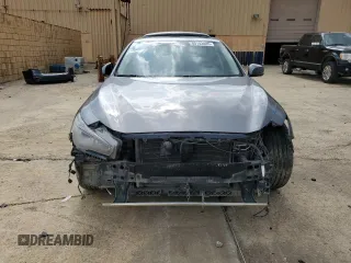 2015 Infiniti Q50 with VIN JN1BV7AP3FM342500, listed as a Copart auction lot 60143085 with 199,848 mi miles and Salvage title. Bid and sale history available at DreamBid. Image 5.