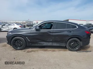 2020 BMW X4 xDrive30i z VIN 5UX2V1C02L9B74309, wystawiony jako IAAI lot #41825211 z przebiegiem 54 049 mil mil oraz . Historia ofert i sprzedaży dostępna na DreamBid. Obrazek 14.