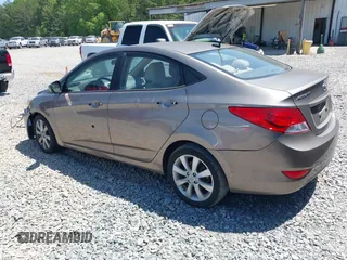 2014 Hyundai Accent GLS with VIN KMHCU4AE7EU736691, listed as a IAAI auction lot 42054514 with 80,715 mi miles and . Bid and sale history available at carsss.com. Image 3.