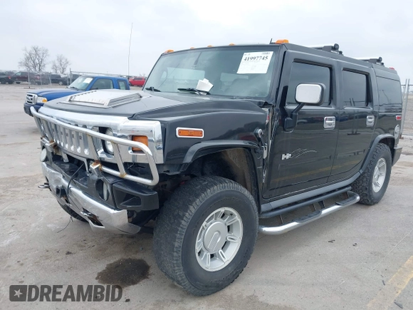 2005 Hummer H2 SUV z VIN 5GRGN23UX5H106375, wystawiony jako IAAI lot #41997745 z przebiegiem 152 827 mil mil oraz . Historia ofert i sprzedaży dostępna na DreamBid. Obrazek 17.