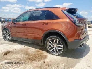 2020 Cadillac XT4 FWD Sport z VIN 1GYFZER45LF025992, wystawiony jako Copart lot #60110325 z przebiegiem 43 820 mil mil oraz Szkoda całkowita • Salvage title. Historia ofert i sprzedaży dostępna na DreamBid. Obrazek 2.