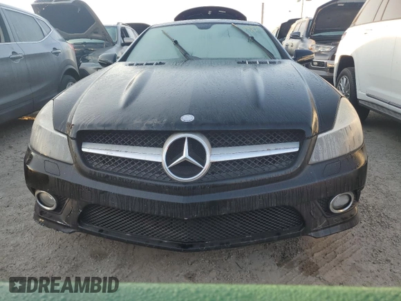 2011 Mercedes-Benz SL 550 z VIN WDBSK7BA3BF162110, wystawiony jako Copart lot #75315214 z przebiegiem Nie podano mil oraz Szkoda całkowita • Salvage title. Historia ofert i sprzedaży dostępna na DreamBid. Obrazek 5.