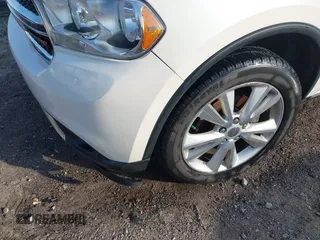2012 Dodge Durango SXT with VIN 1C4RDHAG6CC335790, listed as a IAAI auction lot 41605378 with 204,306 mi miles and . Bid and sale history available at DreamBid. Image 6.