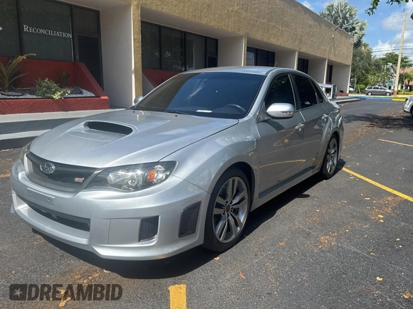 2012 Subaru WRX WRX STI with VIN JF1GV8J65CL002496, listed as a Copart auction lot 64390005 with 182,855 mi miles and Clean title. Bid and sale history available at DreamBid. Image 2.