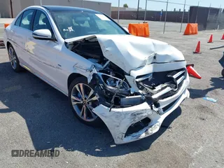 2017 Mercedes-Benz C 350e with VIN 55SWF4HB8HU219807, listed as a IAAI auction lot 41848124 with 43,207 mi miles and . Bid and sale history available at DreamBid. Image 1.