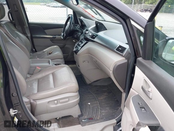 2012 Honda Odyssey EX-L with VIN 5FNRL5H66CB095996, listed as a IAAI auction lot 42446499 with 198,016 mi miles and . Bid and sale history available at DreamBid. Image 5.