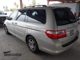 2005 Honda Odyssey EX-L with VIN 5FNRL38615B026205, listed as a IAAI auction lot 42128729 with 172,260 mi miles. Bid and sale history available at carsss.com. Image 3.