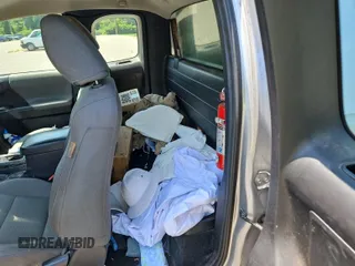2018 Toyota Tacoma SR with VIN 5TFSX5EN6JX062775, listed as a IAAI auction lot 42774090 with 146,583 mi miles and . Bid and sale history available at DreamBid. Image 48.
