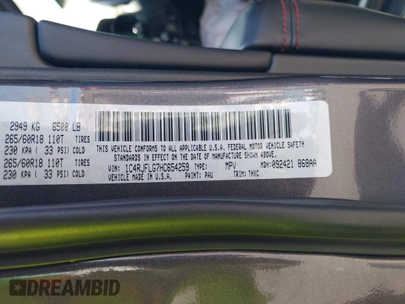 2017 Jeep Grand Cherokee Trailhawk with VIN 1C4RJFLG7HC654259, listed as a IAAI auction lot 42510197 with 103,947 mi miles and . Bid and sale history available at DreamBid. Image 9.