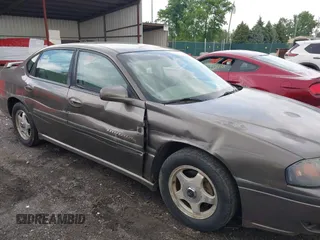 2002 Chevrolet Impala LS z VIN 2G1WH55K829108636, wystawiony jako IAAI lot #42363890 z przebiegiem 244 430 mil mil oraz . Historia ofert i sprzedaży dostępna na DreamBid. Obrazek 6.