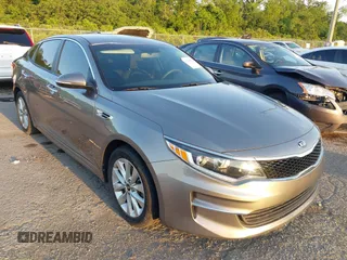 2018 Kia Optima LX with VIN 5XXGT4L33JG261190, listed as a IAAI auction lot 42151562 with 96,810 mi miles and . Bid and sale history available at DreamBid. Image 1.