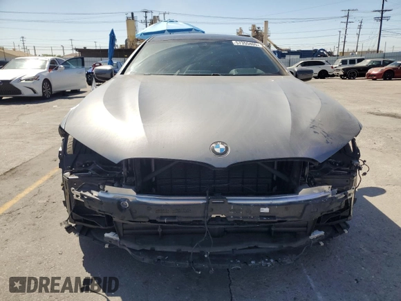2024 BMW 8 Series 840i with VIN WBAGV2C08RCP97713, listed as a Copart auction lot 57355405 with 14,802 mi miles and Salvage title. Bid and sale history available at DreamBid. Image 5.