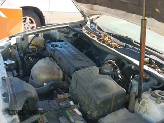 2004 Toyota Camry LE z VIN 4T1BE32K04U345999, wystawiony jako IAAI lot #43459327 z przebiegiem 272 021 mil mil oraz . Historia ofert i sprzedaży dostępna na DreamBid. Obrazek 12.