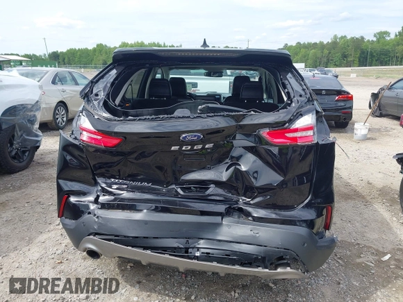 2021 Ford Edge Titanium z VIN 2FMPK3K99MBA16882, wystawiony jako IAAI lot #42214606 z przebiegiem 140 031 mil mil oraz . Historia ofert i sprzedaży dostępna na DreamBid. Obrazek 16.