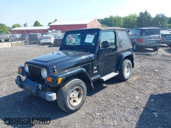 2003 Jeep Wrangler Sahara with VIN 1J4FA59S23P328003, listed as a IAAI auction lot 42833276 with 271,741 mi miles and . Bid and sale history available at DreamBid. Image 2.