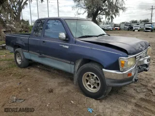 1997 Toyota T100 DX with VIN JT4TN12D7V0038238, listed as a Copart auction lot 79713824 with 233,756 mi miles and Salvage Title. Bid and sale history available at carsss.com. Image 4.