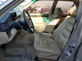 1993 Mercedes-Benz 400 with VIN WDBEA34E2PB941652, listed as a Copart auction lot 50035065 with 162,925 mi miles and Salvage Title. Bid and sale history available at carsss.com. Image 7.