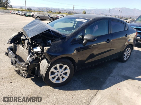 2014 Kia Rio LX with VIN KNADM4A35E6407058, listed as a Copart auction lot 72997044 with 76,215 mi miles and Salvage Title. Bid and sale history available at DreamBid. Image 1.