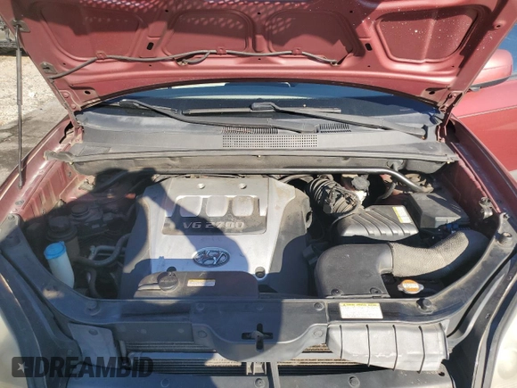 2005 Hyundai Tucson GLS with VIN KM8JN12D15U141358, listed as a Copart auction lot 73715334 with 173,503 mi miles and Salvage Title. Bid and sale history available at carsss.com. Image 12.