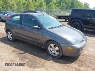 2004 Ford Focus ZX3 z VIN 3FAFP31384R114307, wystawiony jako IAAI lot #42428592 z przebiegiem 134 843 mil mil oraz . Historia ofert i sprzedaży dostępna na DreamBid. Obrazek 1.