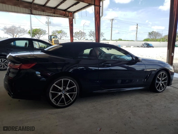 2019 BMW 8 Series M850i xDrive with VIN WBAFY4C59KBX38790, listed as a Copart auction lot 69656654 with 30,863 mi miles and Salvage Title. Bid and sale history available at carsss.com. Image 3.