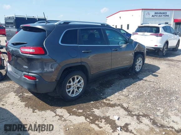 2016 Jeep Cherokee Latitude with VIN 1C4PJLCB1GW113585, listed as a IAAI auction lot 42457964 with 92,736 mi miles and . Bid and sale history available at DreamBid. Image 4.