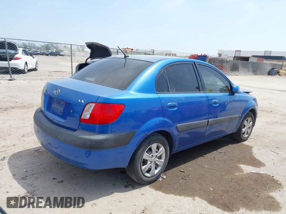 2008 Kia Rio LX with VIN KNADE123886374992, listed as a IAAI auction lot 42027536 with 129,916 mi miles and . Bid and sale history available at DreamBid. Image 4.
