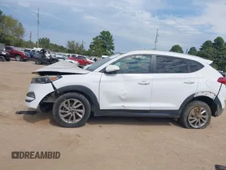 2016 Hyundai Tucson SE z VIN KM8J3CA43GU092864, wystawiony jako IAAI lot #40366787 z przebiegiem 126 462 mil mil oraz . Historia ofert i sprzedaży dostępna na DreamBid. Obrazek 14.