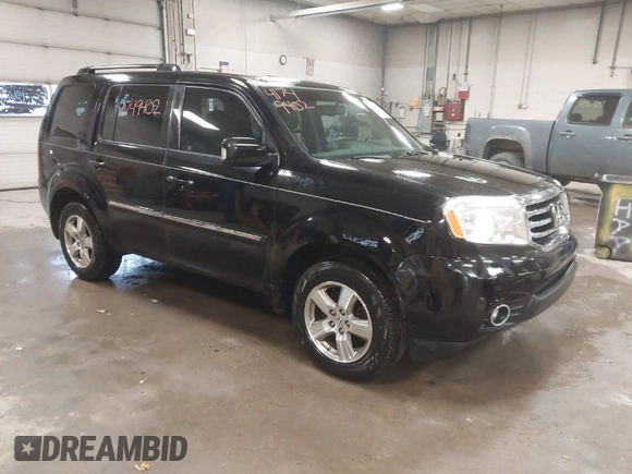 2012 Honda Pilot Touring with VIN 5FNYF4H91CB067014, listed as a IAAI auction lot 41749402 with 151,248 mi miles. Bid and sale history available at carsss.com. Image 1.